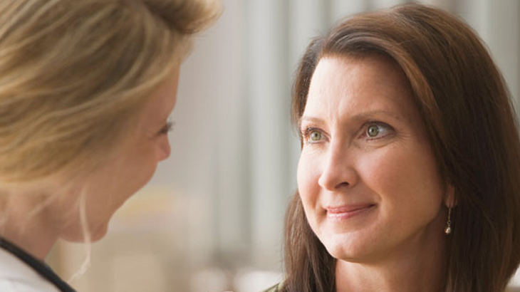 Dermatologist and female patient