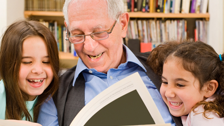 Grandparent reading to children