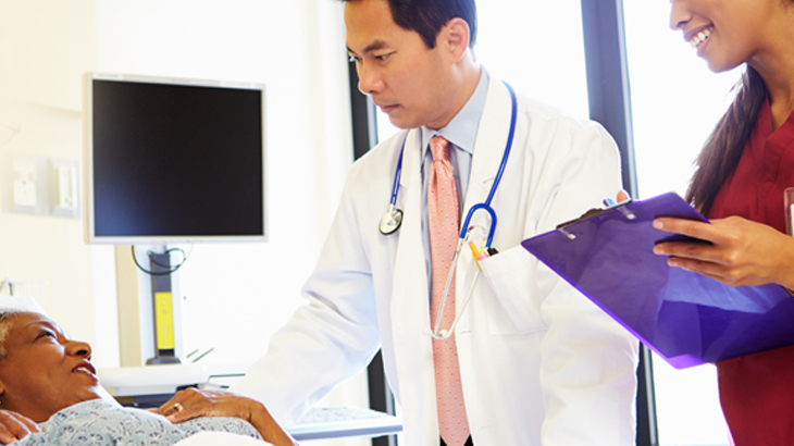 Health professional checking patient