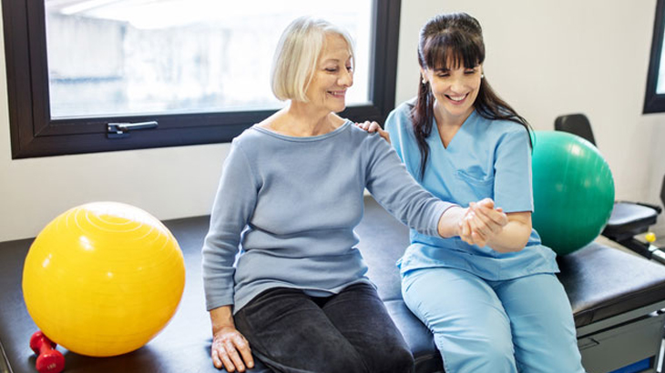 woman relearning how to use arm functions