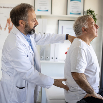 Health Proffesional examining patient